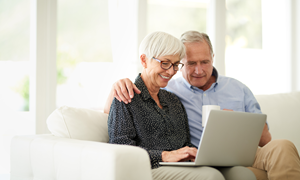 older couple looking at laptop